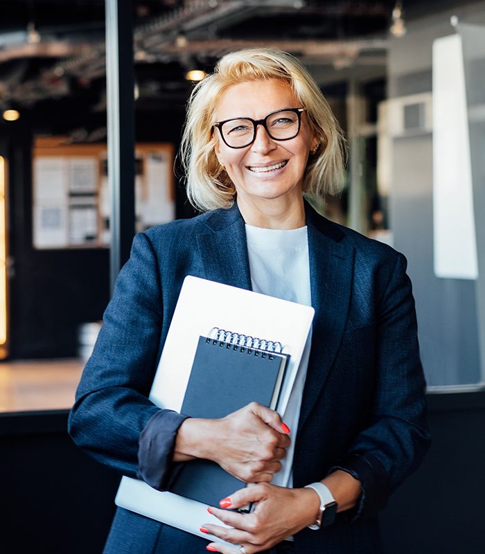 happy-50s-confident-mature-businesswoman-middle-ag-YJASRBA.jpg
